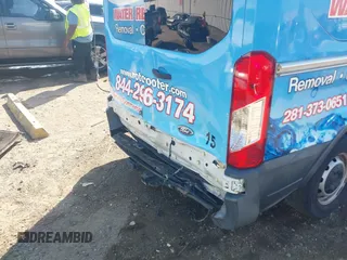 2017 Ford Transit with VIN 1FTYE1CM4HKB06427, listed as a IAAI auction lot 40597787 with 206,386 mi miles and . Bid and sale history available at DreamBid. Image 19.