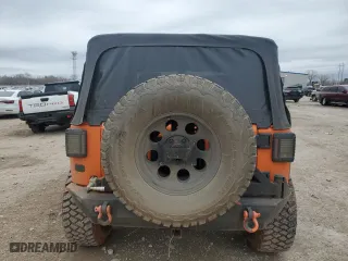2012 Jeep Wrangler JK Sport S with VIN 1C4GJWAG6CL227139, listed as a Copart auction lot 44497345 with 77,928 mi miles and Salvage Title. Bid and sale history available at carsss.com. Image 6.