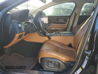 2015 Jaguar XJ Portfolio with VIN SAJWJ2GD2F8V76289, listed as a Copart auction lot 48222815 with 95,420 mi miles and Salvage title. Bid and sale history available at DreamBid. Image 7.