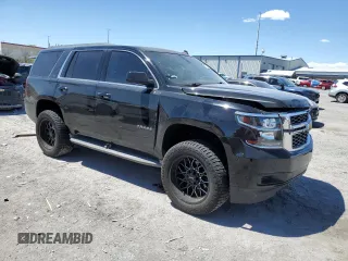 2015 Chevrolet Tahoe LT with VIN 1GNSCBKC6FR297726, listed as a Copart auction lot 55097475 with 114,471 mi miles and Salvage title. Bid and sale history available at DreamBid. Image 4.