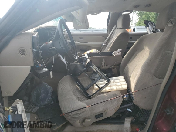 2002 Chevrolet Tahoe LS z VIN 1GNEC13Z92R175303, wystawiony jako Copart lot #54008725 z przebiegiem Nie podano mil oraz Szkoda całkowita • Salvage title. Historia ofert i sprzedaży dostępna na DreamBid. Obrazek 7.