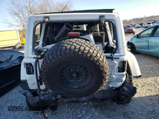 2022 Jeep Wrangler Unlimited Rubicon with VIN 1C4HJXFG6NW184670, listed as a Copart auction lot 84152964 with 31,459 mi miles and Salvage title. Bid and sale history available at DreamBid. Image 6.
