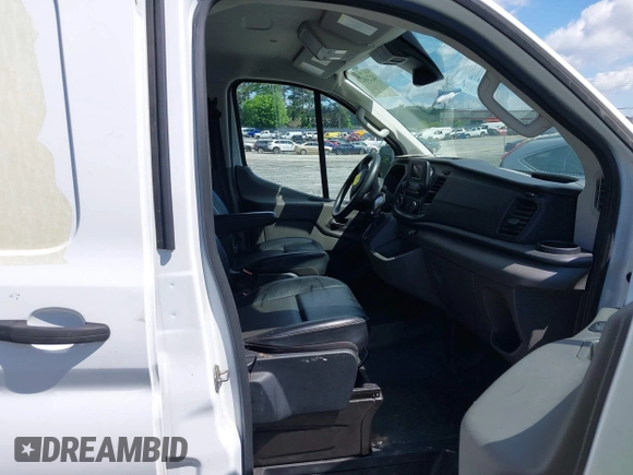 2021 Ford Transit Cargo with VIN 1FTBR1Y83MKA76305, listed as a IAAI auction lot 42240276 with 75,256 mi miles and . Bid and sale history available at DreamBid. Image 5.
