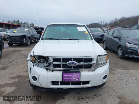 2010 Ford Escape XLS z VIN 1FMCU9C7XAKC89999, wystawiony jako IAAI lot #41506494 z przebiegiem 242 078 mil mil oraz . Historia ofert i sprzedaży dostępna na DreamBid. Obrazek 12.