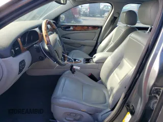 2005 Jaguar XJ with VIN SAJWA79C15SG40523, listed as a Copart auction lot 77994844 with 113,634 mi miles and Clean Title. Bid and sale history available at carsss.com. Image 7.