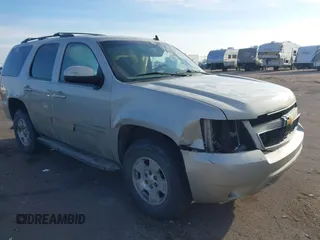 2014 Chevrolet Tahoe LS with VIN 1GNSKAE08ER161675, listed as a IAAI auction lot 41859769 with 160,711 mi miles and . Bid and sale history available at DreamBid. Image 1.