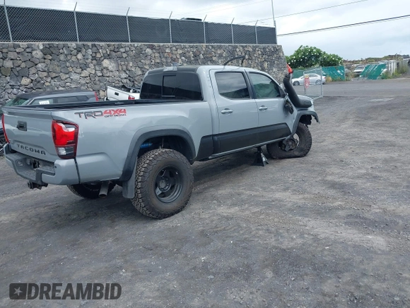 2018 Toyota Tacoma SR5 with VIN 3TMDZ5BN3JM039497, listed as a IAAI auction lot 42326823 with 92,977 mi miles and . Bid and sale history available at DreamBid. Image 4.