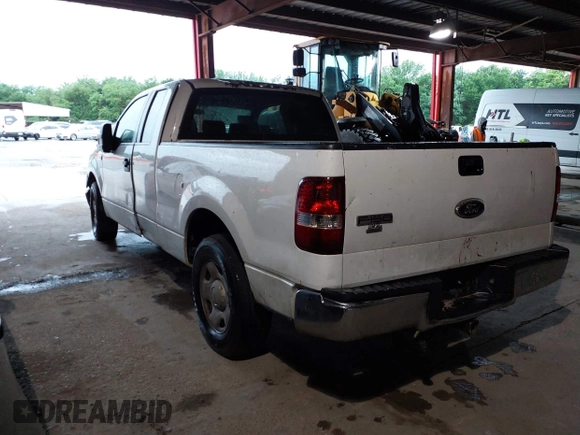 2007 Ford F-150 STX with VIN 1FTRX12W87FB37995, listed as a IAAI auction lot 42186007 with 228,249 mi miles and . Bid and sale history available at DreamBid. Image 3.