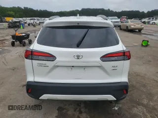 2023 Toyota Corolla Cross XLE with VIN 7MUDAABG3PV044005, listed as a Copart auction lot 54955225 with 50,712 mi miles and Salvage title. Bid and sale history available at DreamBid. Image 6.