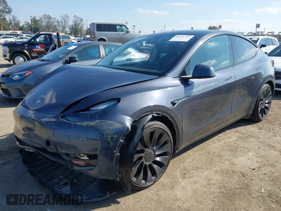 2023 Tesla Model Y Performance with VIN 7SAYGDEF5PF823122, listed as a IAAI auction lot 41546480 with 12,943 mi miles and . Bid and sale history available at DreamBid. Image 19.