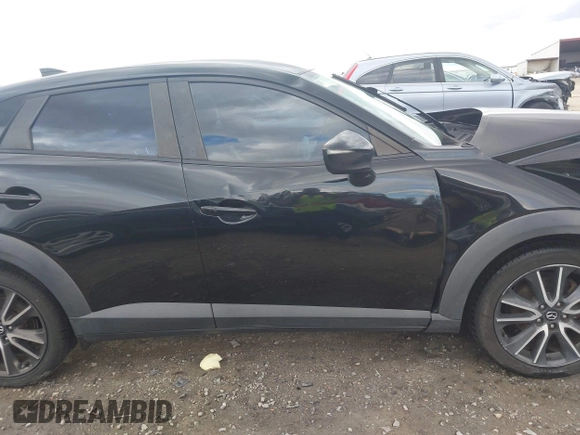 2017 Mazda CX-3 Touring with VIN JM1DKFC70H0163315, listed as a IAAI auction lot 41721515 with 144,662 mi miles. Bid and sale history available at carsss.com. Image 13.