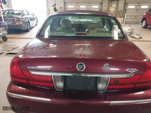 2004 Mercury Grand Marquis GS with VIN 2MEFM74W44X660876, listed as a IAAI auction lot 41915559 with 138,546 mi miles. Bid and sale history available at carsss.com. Image 16.
