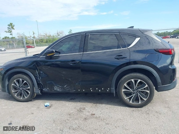 2022 Mazda CX-5 2.5 S Premium Package with VIN JM3KFBDM1N0577232, listed as a IAAI auction lot 41289385 with NaN miles. Bid and sale history available at carsss.com. Image 14.