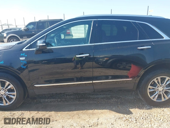 2023 Cadillac XT5 AWD Premium Luxury with VIN 1GYKNDRS7PZ158566, listed as a IAAI auction lot 41763127 with 58,248 mi miles and . Bid and sale history available at DreamBid. Image 14.