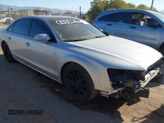 2011 Audi A8 z VIN WAURVAFD4BN020585, wystawiony jako IAAI lot #41841459 z przebiegiem 110 536 mil mil oraz . Historia ofert i sprzedaży dostępna na DreamBid. Obrazek 1.