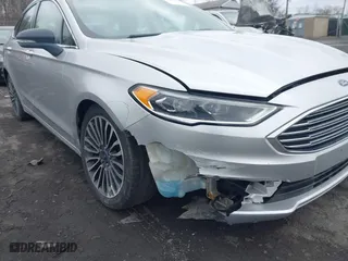 2018 Ford Fusion Titanium with VIN 3FA6P0D99JR139114, listed as a IAAI auction lot 41991248 with 142,324 mi miles. Bid and sale history available at carsss.com. Image 6.