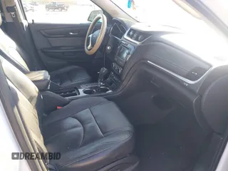 2016 Chevrolet Traverse LT z VIN 1GNKRHKD0GJ271990, wystawiony jako IAAI lot #41286827 z przebiegiem 115 216 mil mil oraz . Historia ofert i sprzedaży dostępna na DreamBid. Obrazek 5.