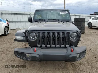 2023 Jeep Gladiator Rubicon with VIN 1C6JJTBG7PL573197, listed as a Copart auction lot 53866075 with 19,521 mi miles and Salvage title. Bid and sale history available at DreamBid. Image 5.