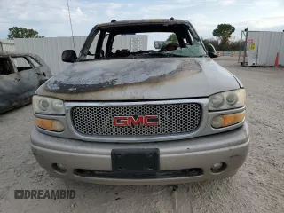 2005 GMC Sierra Denali z VIN 2GTEK63N651271425, wystawiony jako Copart lot #66397764 z przebiegiem Nie podano mil oraz Szkody całkowita. Historia ofert i sprzedaży dostępna na DreamBid. Obrazek 5.