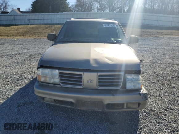 2000 Oldsmobile Bravada z VIN 1GHDT13W1Y2225360, wystawiony jako Copart lot #42967155 z przebiegiem 231 720 mil mil oraz Szkody całkowita. Historia ofert i sprzedaży dostępna na DreamBid. Obrazek 5.
