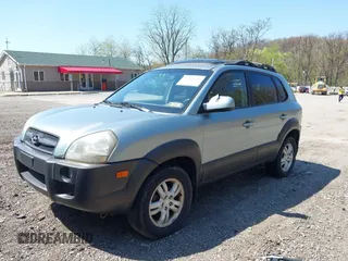 2006 Hyundai Tucson GLS with VIN KM8JN12D06U285856, listed as a IAAI auction lot 42112640 with 157,016 mi miles. Bid and sale history available at carsss.com. Image 2.