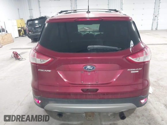 2013 Ford Escape Titanium with VIN 1FMCU9J98DUA72061, listed as a IAAI auction lot 41979558 with 176,667 mi miles and . Bid and sale history available at DreamBid. Image 16.