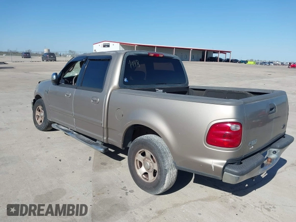 2002 Ford F-150 XLT with VIN 1FTRW07672KB31448, listed as a IAAI auction lot 41226836 with 265,234 mi miles. Bid and sale history available at carsss.com. Image 3.