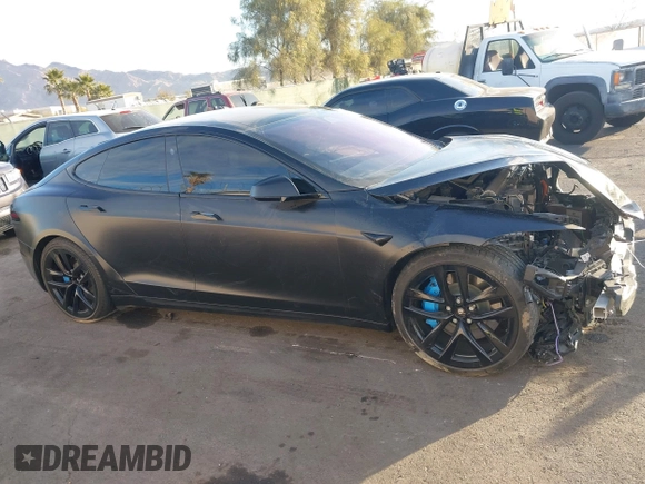 2022 Tesla Model S with VIN 5YJSA1E57NF493457, listed as a IAAI auction lot 41456284 with Not Provided miles and . Bid and sale history available at DreamBid. Image 13.