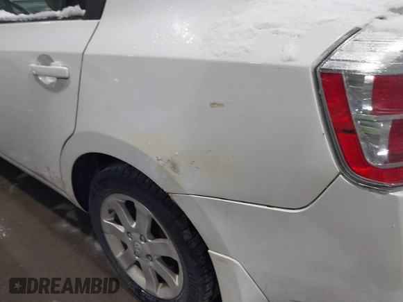 2011 Nissan Sentra 2.0 with VIN 3N1AB6AP1BL634021, listed as a IAAI auction lot 41395419 with 129,385 mi miles and . Bid and sale history available at DreamBid. Image 6.