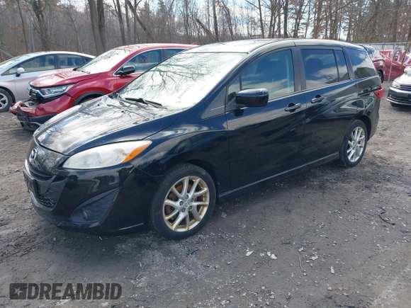 2012 Mazda 5 Touring with VIN JM1CW2CL8C0111574, listed as a IAAI auction lot 41999112 with 126,963 mi miles and . Bid and sale history available at DreamBid. Image 17.