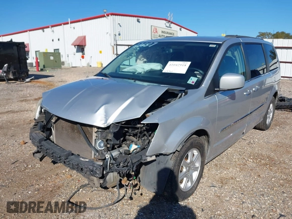 2012 Chrysler Town & Country Touring with VIN 2C4RC1BGXCR338160, listed as a IAAI auction lot 41042918 with 214,961 mi miles and . Bid and sale history available at DreamBid. Image 6.