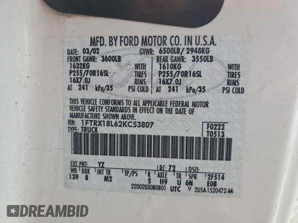 2002 Ford F-150 XL with VIN 1FTRX18L62KC53807, listed as a Copart auction lot 57463075 with 173,301 mi miles and Salvage title. Bid and sale history available at DreamBid. Image 12.