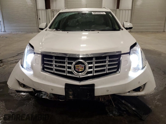 2014 Cadillac SRX Premium Collection z VIN 3GYFNGE36ES581361, wystawiony jako Copart lot #88540815 z przebiegiem 137 047 mil mil oraz Nie do naprawy. Historia ofert i sprzedaży dostępna na DreamBid. Obrazek 5.