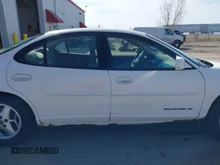 2003 Pontiac Grand Prix SE z VIN 1G2WK52J93F126127, wystawiony jako IAAI lot #42078346 z przebiegiem 236 183 mil mil oraz . Historia ofert i sprzedaży dostępna na DreamBid. Obrazek 13.