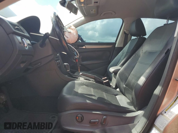 2015 Volkswagen Passat SE с VIN 1VWBS7A39FC063364, выставлен на аукционе Copart как лот 69635734 с пробегом 143 658 миль миль и Списание • Salvage title. История ставок и продаж доступна на DreamBid. Изображение 7.