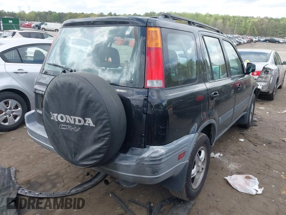 1999 Honda CR-V EX with VIN JHLRD1866XC055610, listed as a IAAI auction lot 41953453 with 152,557 mi miles. Bid and sale history available at carsss.com. Image 4.