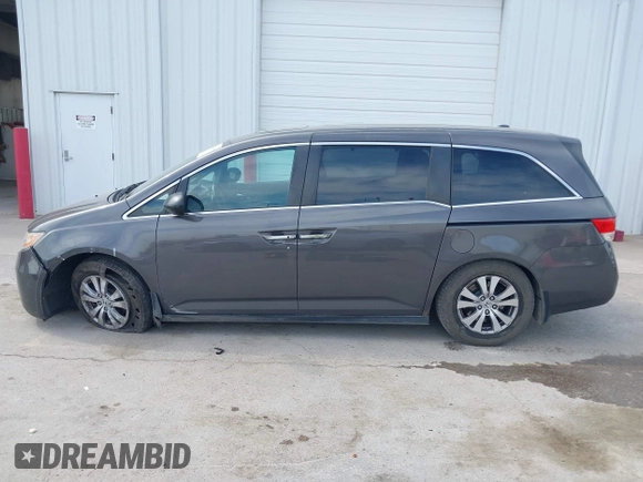 2014 Honda Odyssey EX-L with VIN 5FNRL5H67EB106183, listed as a IAAI auction lot 42210600 with 196,166 mi miles and . Bid and sale history available at DreamBid. Image 14.