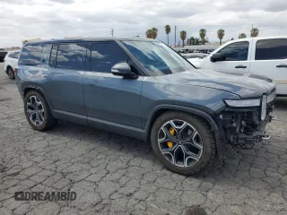 2022 Rivian R1S Launch Edition z VIN 7PDSGABL5NN001018, wystawiony jako Copart lot #56914725 z przebiegiem 26 156 mil mil oraz Szkoda całkowita • Salvage title. Historia ofert i sprzedaży dostępna na DreamBid. Obrazek 4.