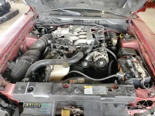 2004 Ford Mustang Deluxe z VIN 1FAFP44654F204619, wystawiony jako Copart lot #62414685 z przebiegiem 235 467 mil mil oraz Szkoda całkowita • Salvage title. Historia ofert i sprzedaży dostępna na DreamBid. Obrazek 11.