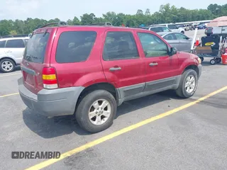 2006 Ford Escape XLT with VIN 1FMYU03136KD09448, listed as a IAAI auction lot 42578120 with 235,521 mi miles and . Bid and sale history available at DreamBid. Image 4.