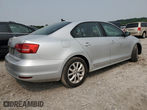 2015 Volkswagen Jetta SE z VIN 3VWD17AJXFM256597, wystawiony jako Copart lot #58774095 z przebiegiem 150 969 mil mil oraz Szkoda całkowita • Salvage title. Historia ofert i sprzedaży dostępna na DreamBid. Obrazek 3.