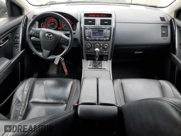 2011 Mazda CX-9 Touring with VIN JM3TB3CV7B0326839, listed as a Copart auction lot 57061345 with 111,832 mi miles and Salvage title. Bid and sale history available at DreamBid. Image 8.