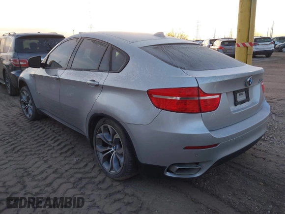 2012 BMW X6 50i z VIN 5UXFG8C58CL590171, wystawiony jako IAAI lot #41087730 z przebiegiem 83 143 mil mil oraz . Historia ofert i sprzedaży dostępna na DreamBid. Obrazek 3.