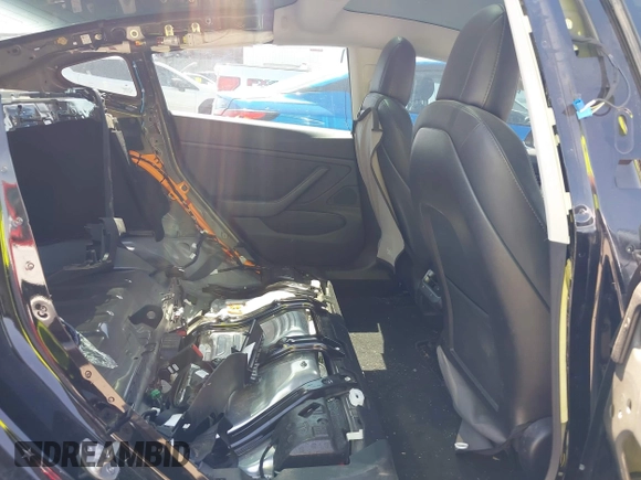2018 Tesla Model 3 Long Range Battery with VIN 5YJ3E1EA7JF098632, listed as a IAAI auction lot 42002181 with 73,371 mi miles and . Bid and sale history available at DreamBid. Image 8.
