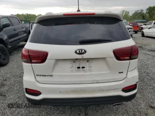 2020 Kia Sorento LX z VIN 5XYPG4A31LG698806, wystawiony jako Copart lot #52627055 z przebiegiem 107 023 mil mil oraz Szkoda całkowita • Salvage title. Historia ofert i sprzedaży dostępna na DreamBid. Obrazek 6.