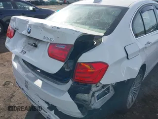 2014 BMW 3 Series 335i xDrive with VIN WBA3B9C52EJ466045, listed as a IAAI auction lot 41281384 with 136,329 mi miles. Bid and sale history available at carsss.com. Image 17.
