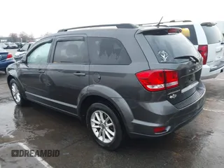 2015 Dodge Journey SXT with VIN 3C4PDCBB7FT735721, listed as a IAAI auction lot 41775824 with 113,446 mi miles and . Bid and sale history available at DreamBid. Image 14.