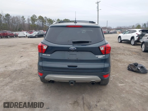 2019 Ford Escape Titanium with VIN 1FMCU9J93KUB84831, listed as a IAAI auction lot 41514146 with 105,072 mi miles. Bid and sale history available at carsss.com. Image 16.
