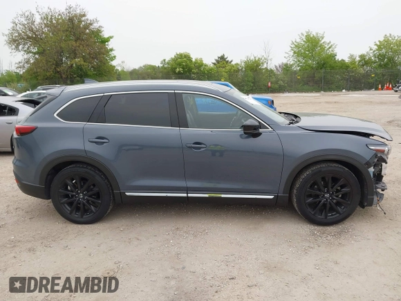 2023 Mazda CX-9 Grand Touring with VIN JM3TCBDY2P0636226, listed as a IAAI auction lot 42384360 with 161,352 mi miles and . Bid and sale history available at DreamBid. Image 14.