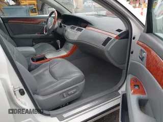 2006 Toyota Avalon XL z VIN 4T1BK36B26U103625, wystawiony jako IAAI lot #42179414 z przebiegiem 256 027 mil mil oraz . Historia ofert i sprzedaży dostępna na DreamBid. Obrazek 5.